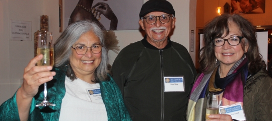 group of older alumni smiling